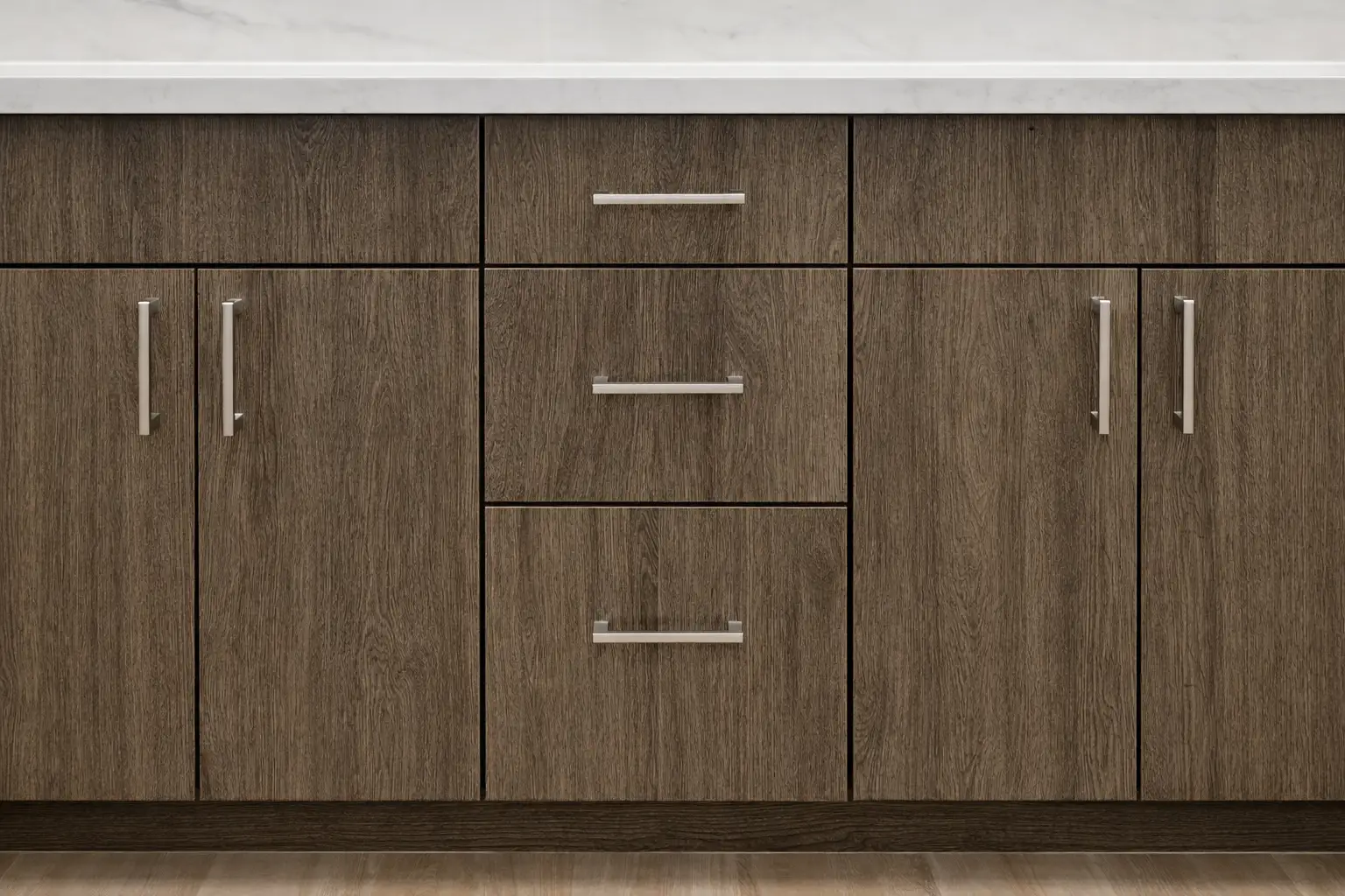 Custom wood bathroom vanity cabinets with modern hardware as part of a bathroom remodeling project in Freehold, NJ.