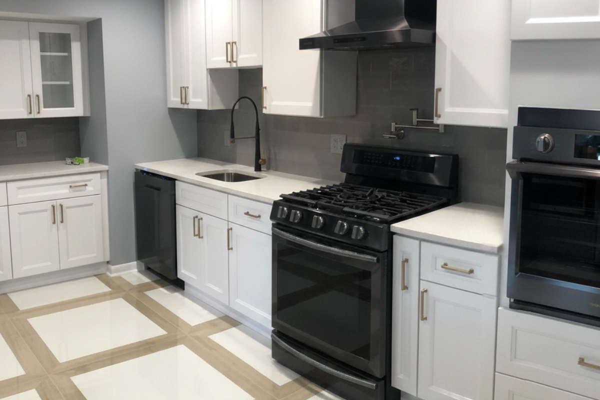 White shaker cabinets with geometric tile floor in a Matawan NJ kitchen remodel