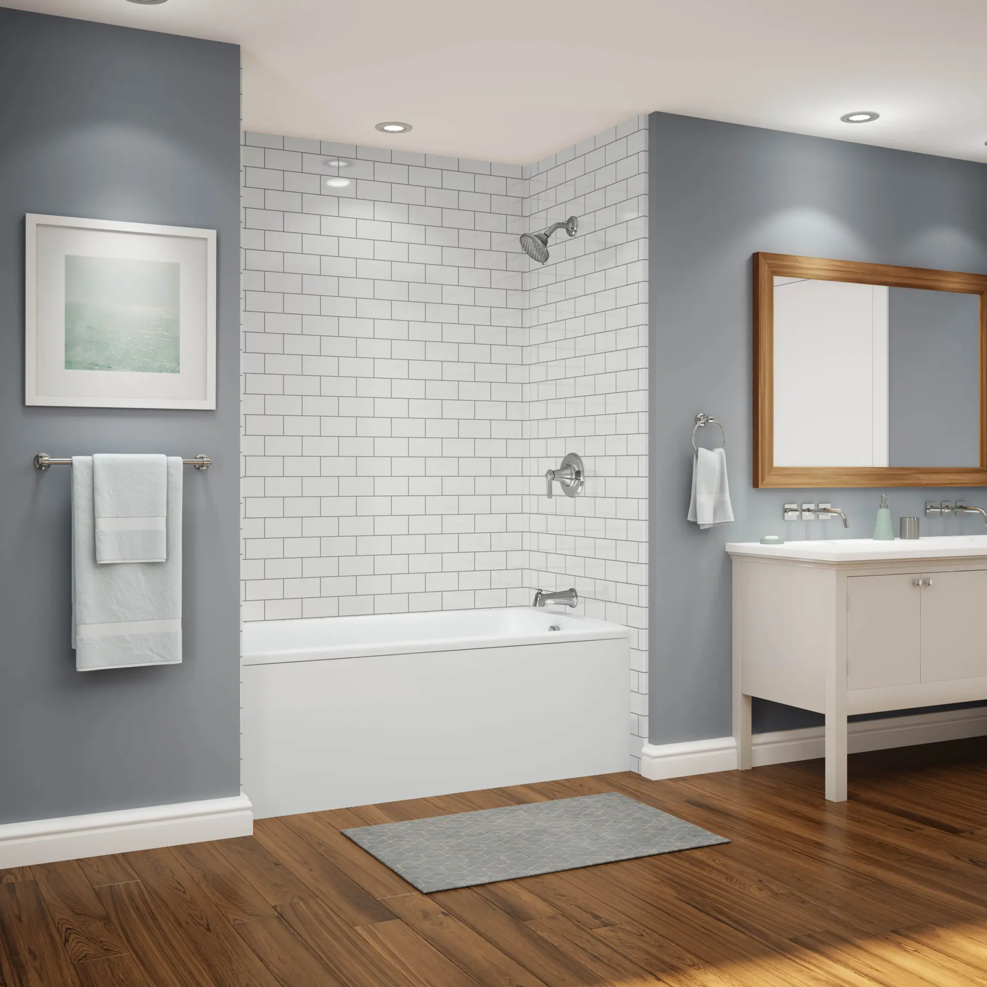 Gray bathroom with subway tile tub surround and white vanity